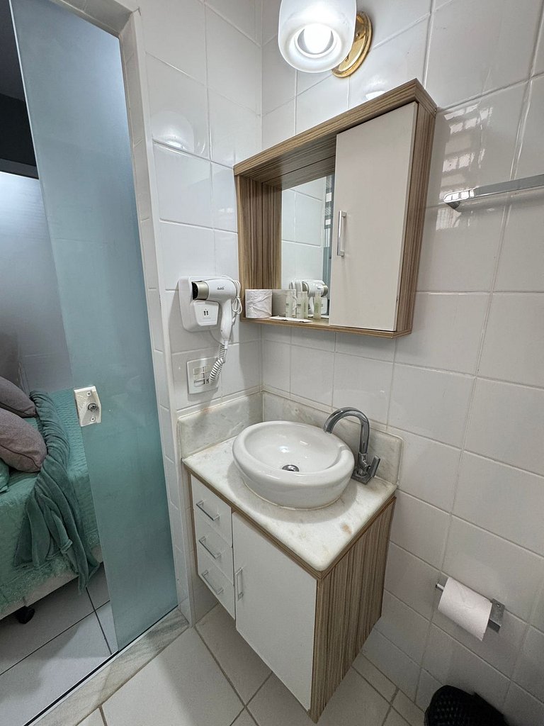 Na Quadra da Praia com 2 Suites